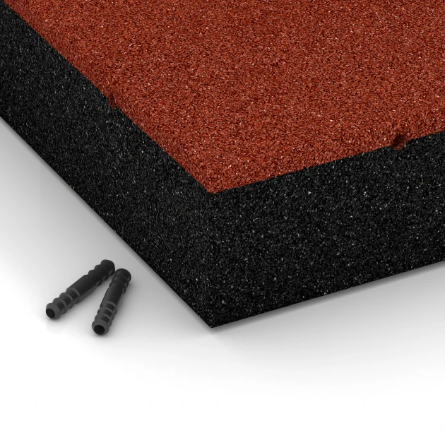 Detailaufnahme der Randausprägung von WARCO-Produkt 6209, Fallschutzplatten, Format 50 x 50 x 11 cm, Farbe Ziegelrot.