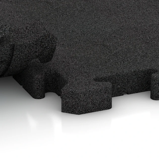 Großaufnahme vom Verbindungssystem von WARCO-Boden 2960 - Fallschutz-Puzzlematte im Farbdesign Anthrazit. Abmessungen 500 x 500 x 40 mm.