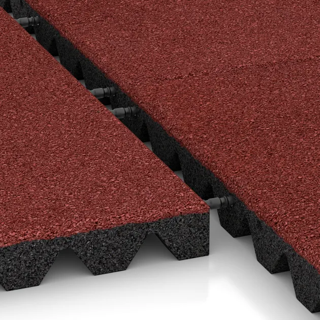 Großaufnahme vom Verbindungssystem von WARCO-Boden 0630 - Fallschutzplatte im Farbdesign Korallenrot. Abmessungen 500 x 500 x 45 mm.