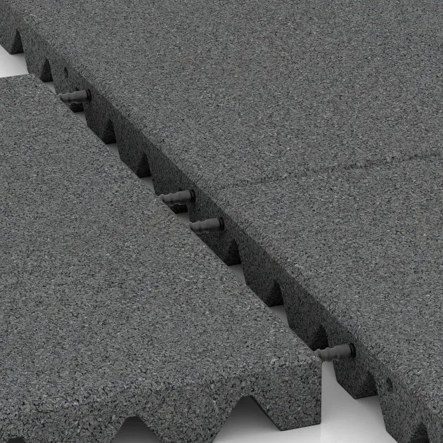 Großaufnahme vom Verbindungssystem von WARCO-Boden 0657 - Wandschutzplatte im Farbdesign Schiefergrau. Abmessungen 500 x 500 x 45 mm.