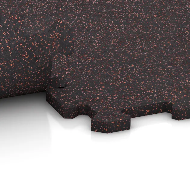 Großaufnahme vom Verbindungssystem von WARCO-Boden 1126 - Fitnessboden Kompakt im Farbdesign Leicht Rot Gesprenkelt. Abmessungen 970 x 970 x 16 mm | 0,94 m².