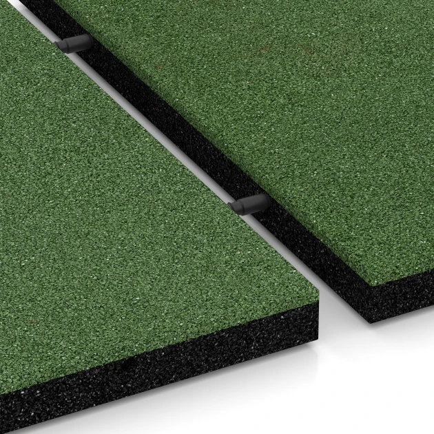 Großaufnahme vom Verbindungssystem von WARCO-Boden 6195 - Fallschutzplatte im Farbdesign Grasgrün. Abmessungen 500 x 500 x 40 mm.