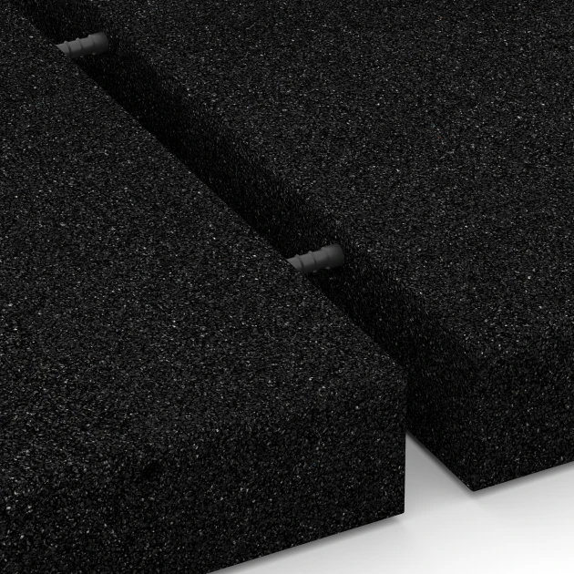Großaufnahme vom Verbindungssystem von WARCO-Boden 6172 - Fallschutzplatten im Farbdesign Anthrazit. Abmessungen 50 x 50 x 8 cm.