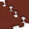 Großaufnahme vom Verbindungssystem von WARCO-Boden 6313 - Fallschutz-Puzzlematte im Farbdesign Ziegelrot. Abmessungen 50 x 50 x 2 cm | 0,25 m².