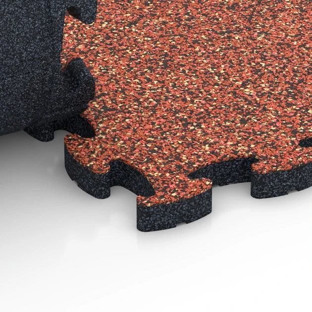 Großaufnahme vom Verbindungssystem von WARCO-Boden 6935 - Fallschutz Puzzlematte im Farbdesign Feuersglut. Abmessungen 44,6 x 44,6 × 2,8 cm.