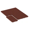 Typische Verlegung oder Einbausituation für den Artikel 6117 von WARCO - Fallschutz-Rasengittermatte, Farbton Ziegelrot in der Abmessung 100 × 50 × 6,5 cm.